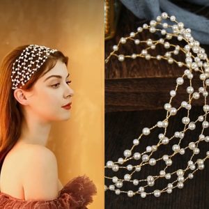 Accessorio con perle e design dorato